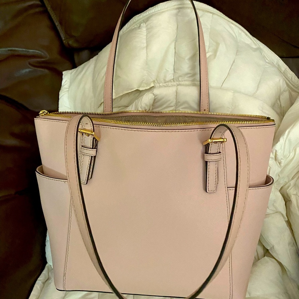 Michael Kors light pink purse - excellent condition- used 60 days - still tagged